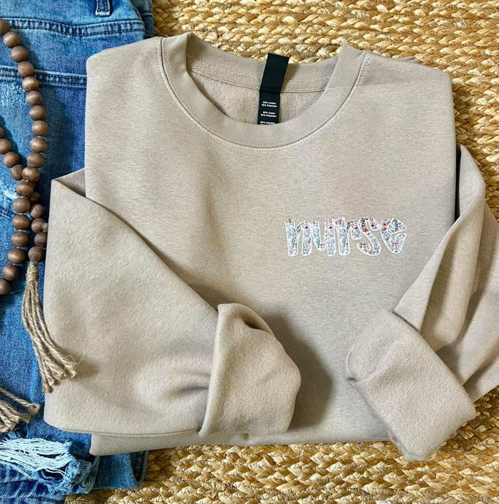 Floral Nurse Chest Desert Tan Crewneck